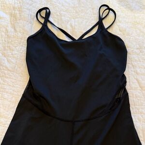 Black Strappy jumper with sheer side on legs and waist